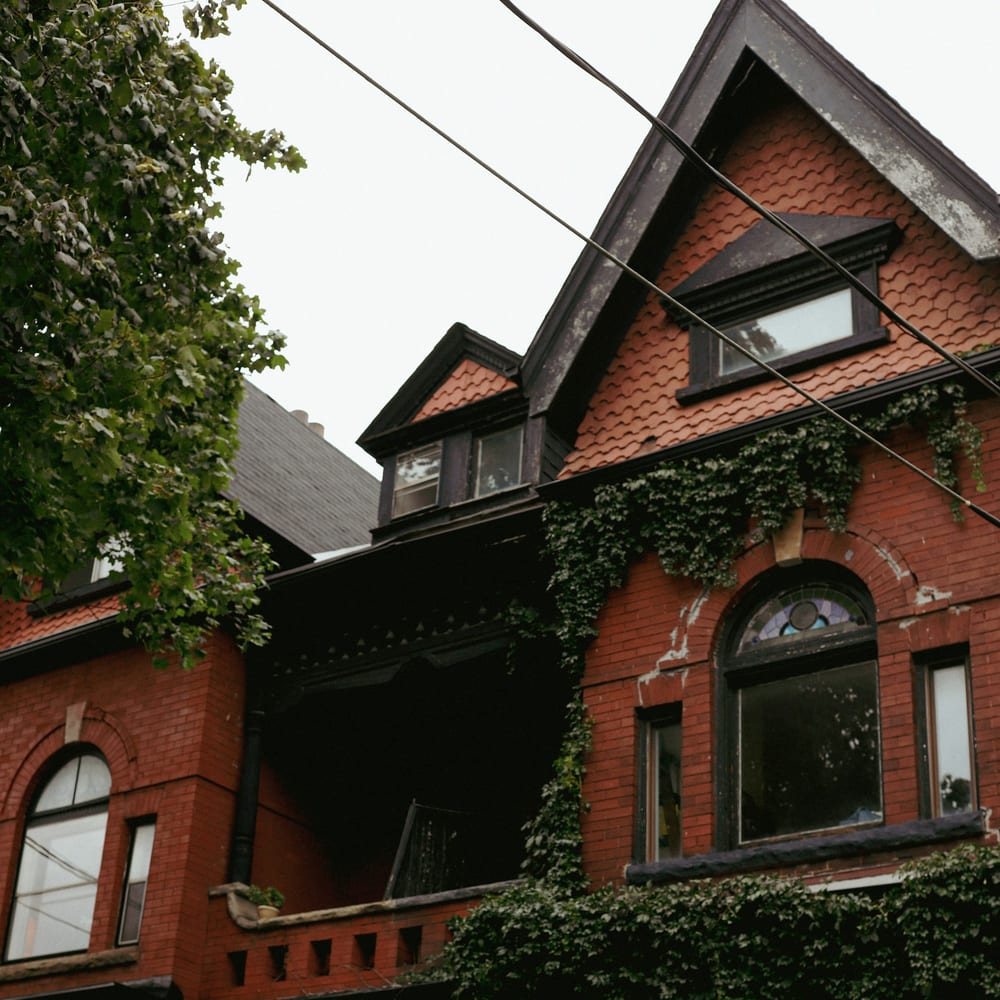 An established red-brick Toronto home with ivy